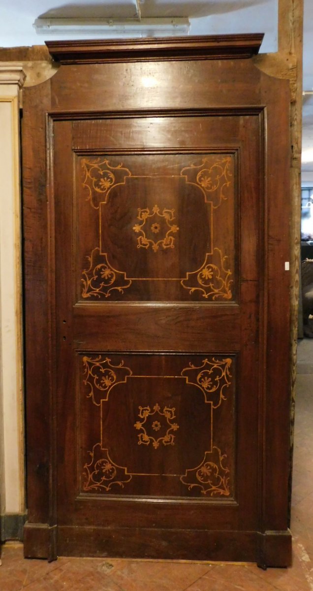 A pti575 inlaid walnut door with frame,meas. max h cm 235 x 120