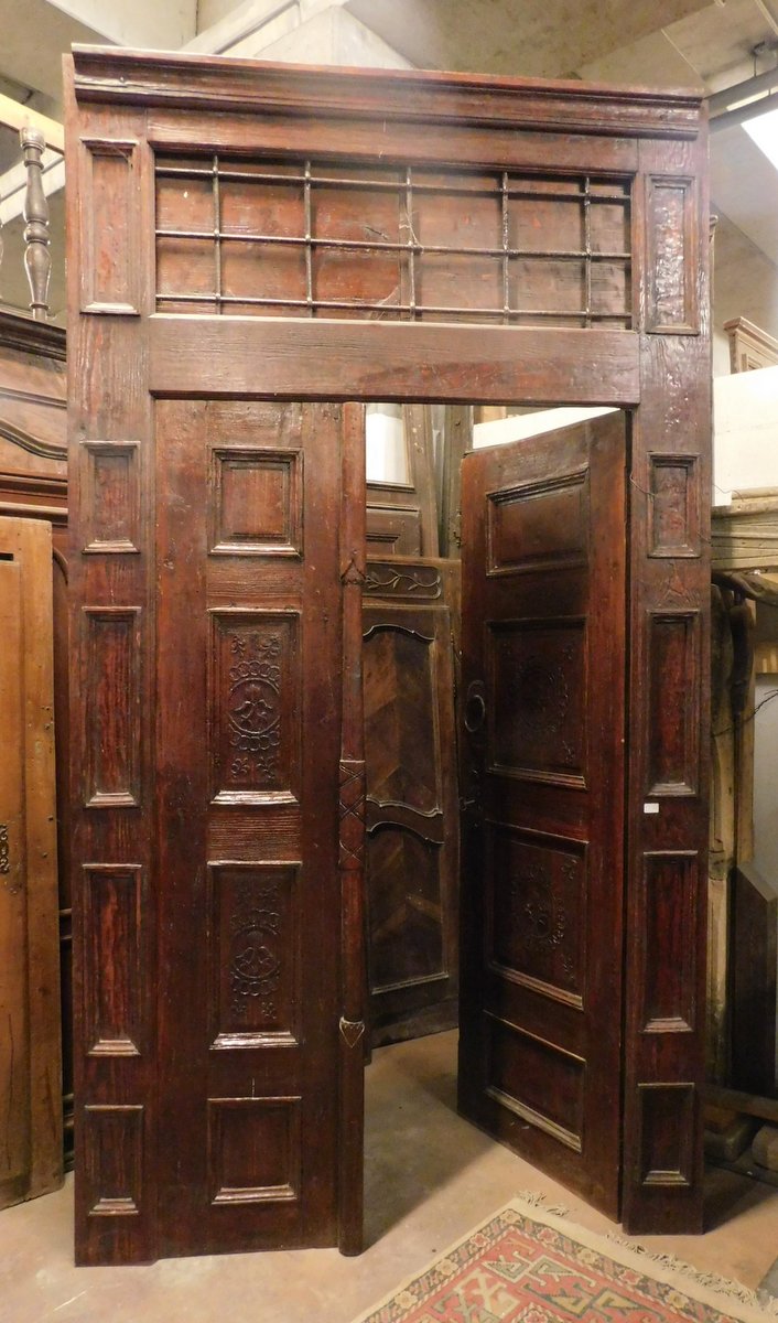 A ptcr418 door  carved larch,with portal  h cm 284 x 157 cm max