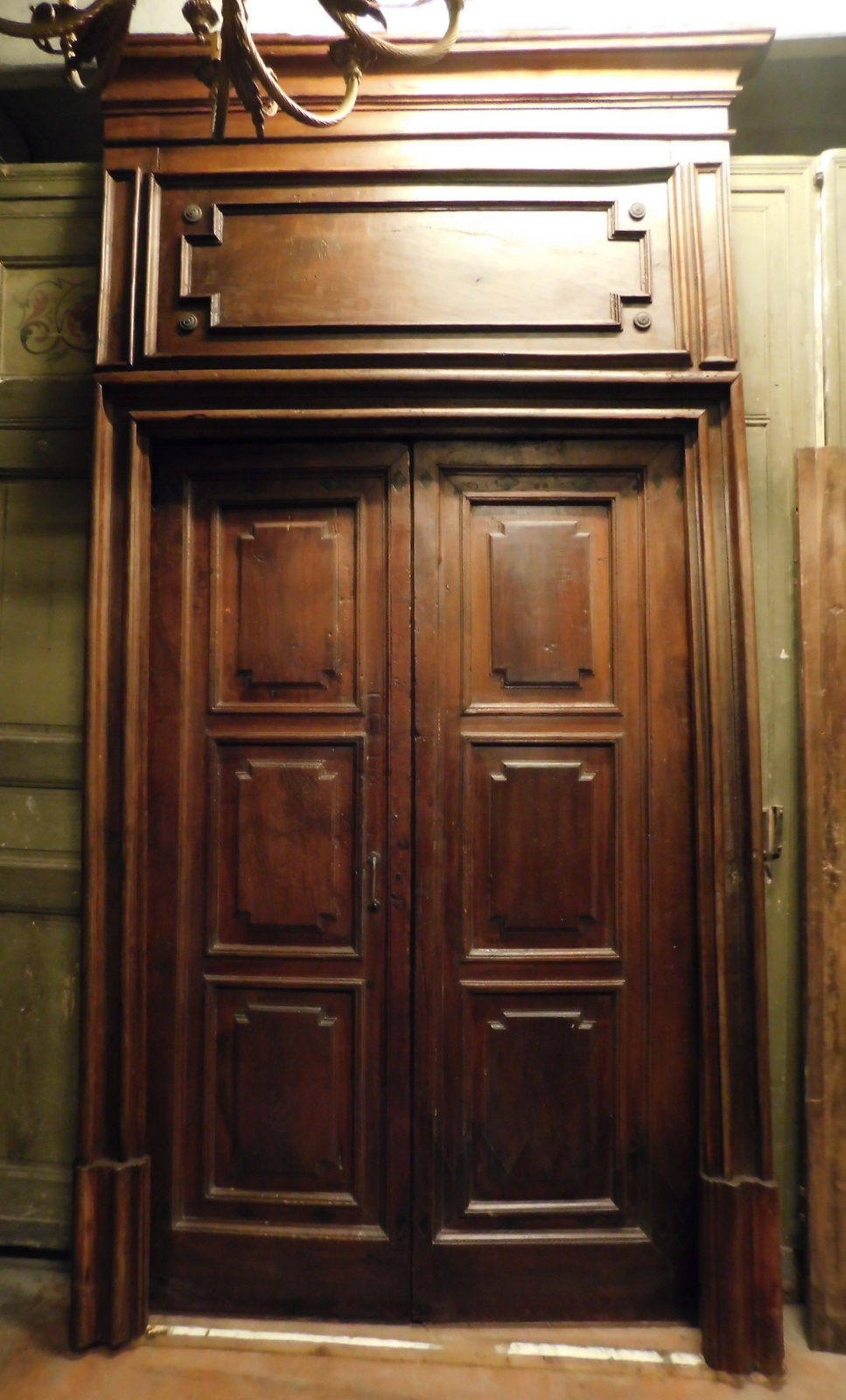 A ptci522 - walnut door complete with portal, 18th century, cm w 165 x h 320
